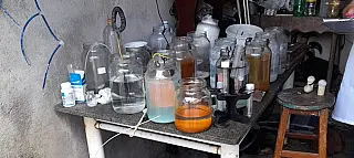 Polícia fecha laboratório clandestino e detém homem que dizia que 'água da vida' curava Covid-19